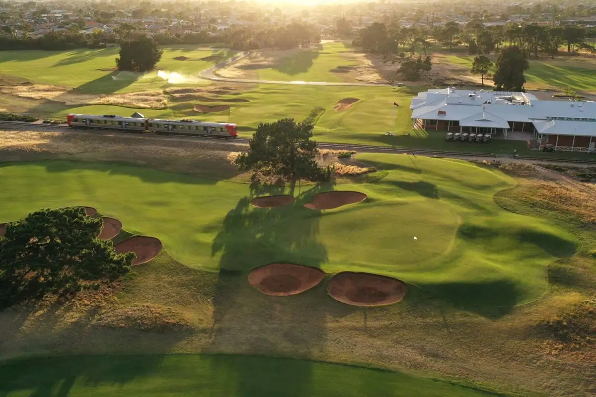 Royal Adelaide Golf Club - Par 5, 2nd Hole, Par 4, 18th Hole, Railway Line & Clubhouse / Photo: Gary Lisbon Golf Photography